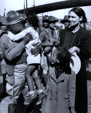 A soldier bids farewell to his family, 1942